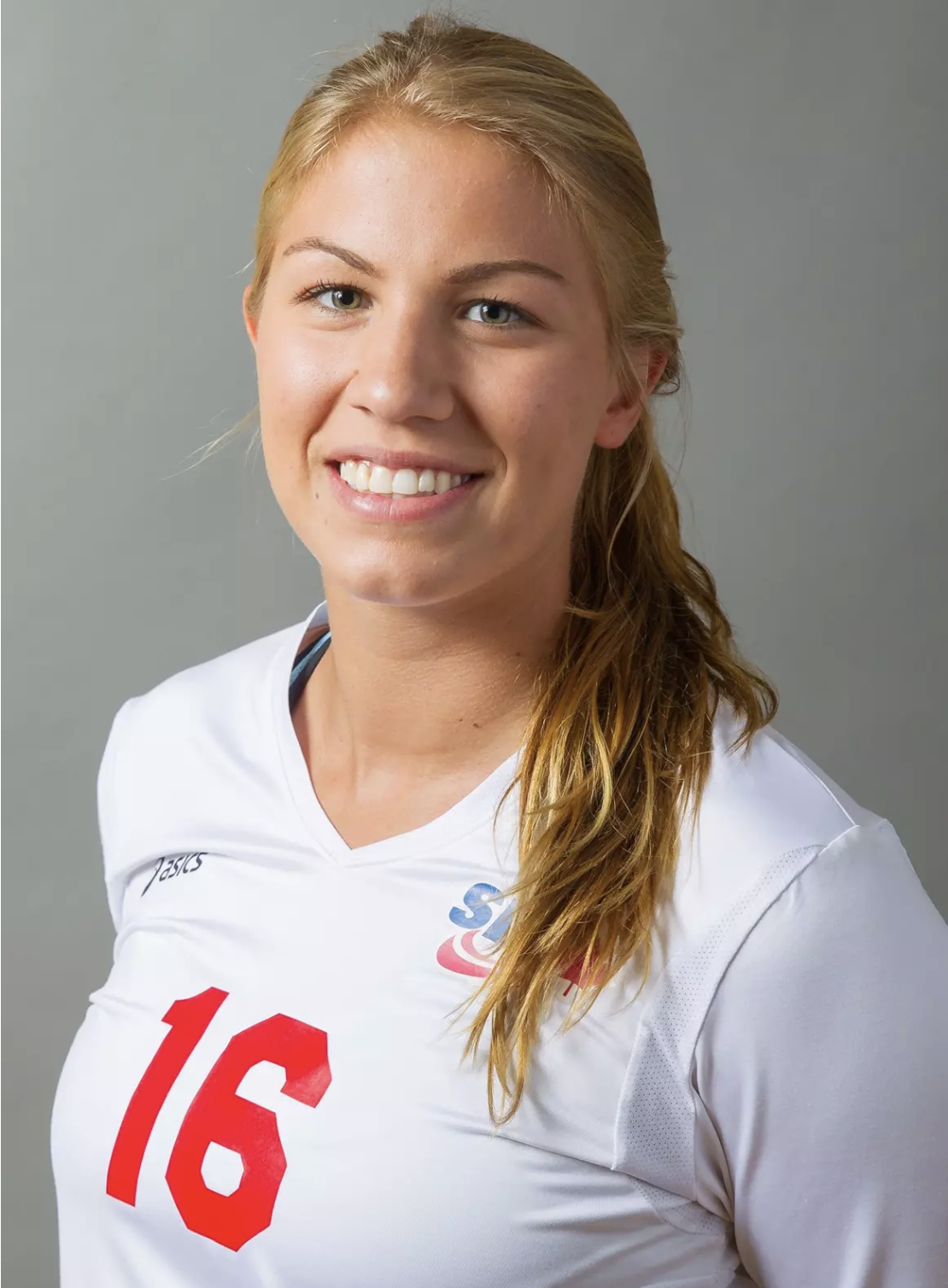 Amanda Renkema wearing a white volleyball jersey